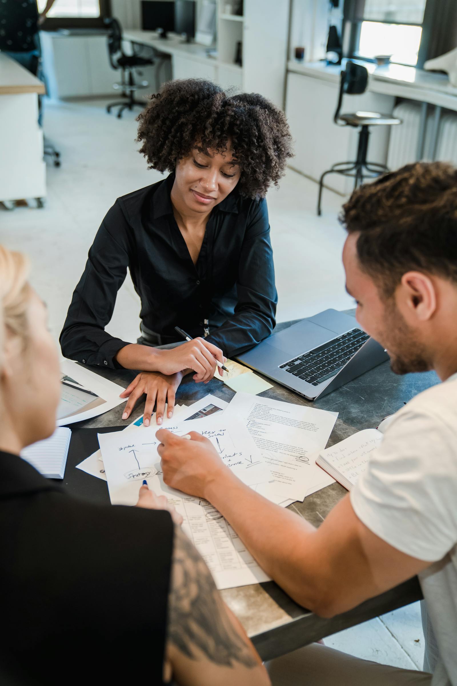 Team reviewing documents and privacy-related information in an office